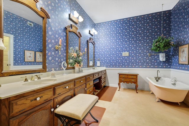 bathroom featuring double vanity and a bathing tub