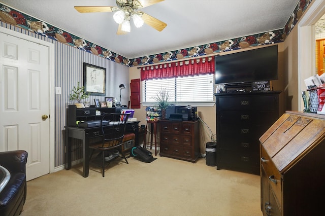 office featuring carpet flooring and ceiling fan