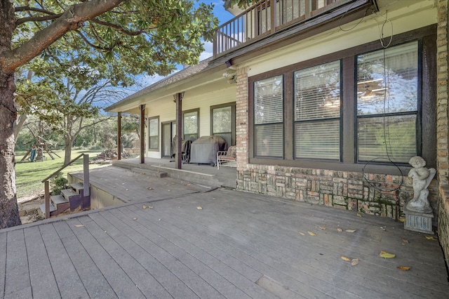 wooden deck with area for grilling