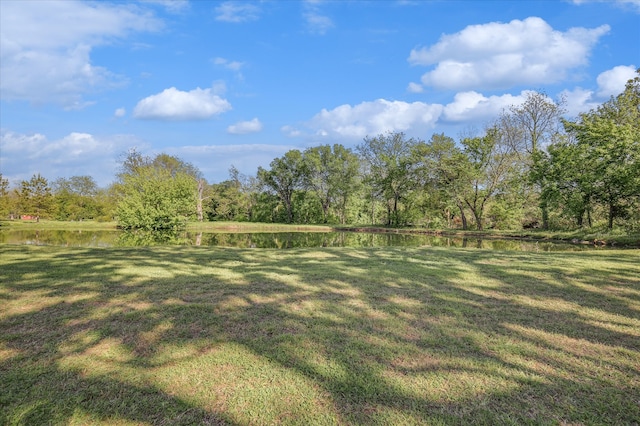 view of yard with a water view