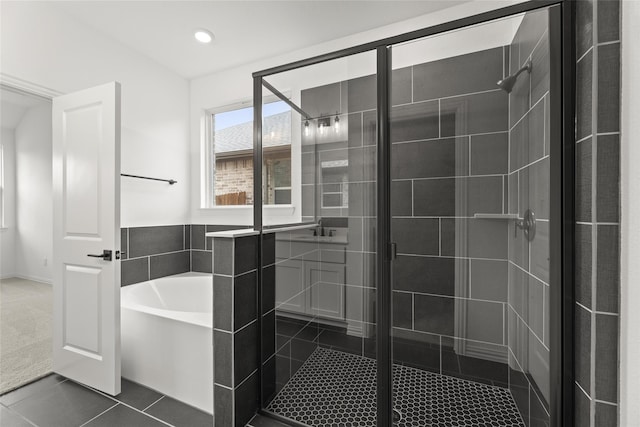 bathroom featuring tile patterned floors, independent shower and bath, and vanity