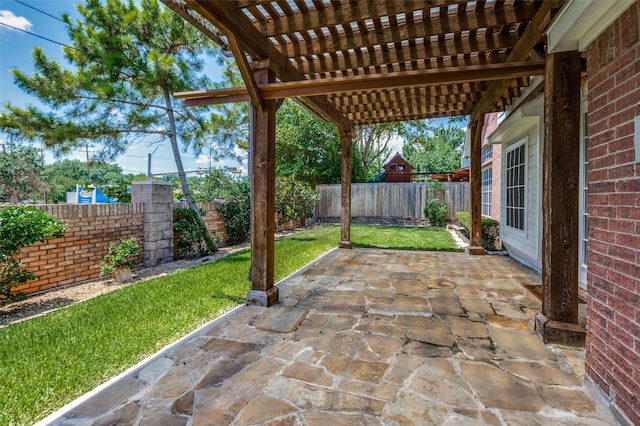 view of patio featuring a pergola