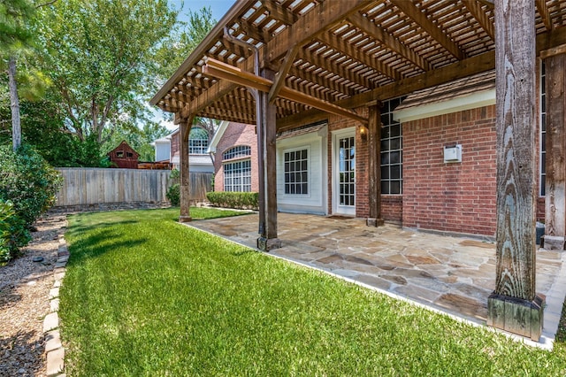 view of yard with a pergola and a patio area