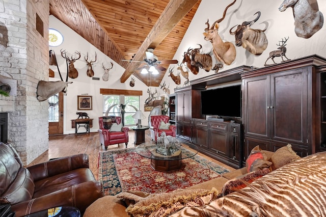 living room featuring a fireplace, ceiling fan, wooden ceiling, beamed ceiling, and dark hardwood / wood-style floors