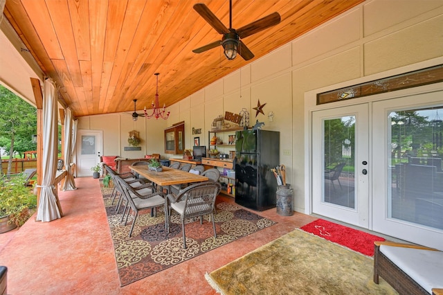 view of patio / terrace featuring ceiling fan and french doors