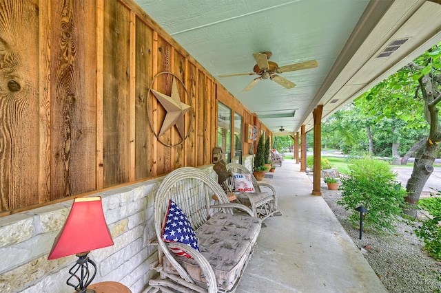 view of patio with ceiling fan