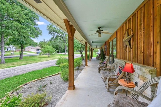 view of patio featuring ceiling fan