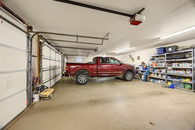 garage featuring a garage door opener