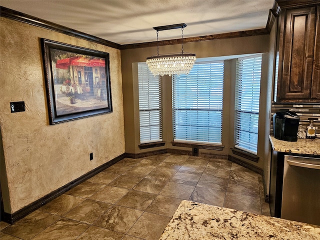 unfurnished dining area featuring ornamental molding, a chandelier, and a textured ceiling