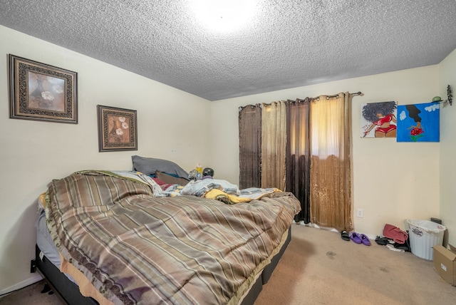 carpeted bedroom with a textured ceiling