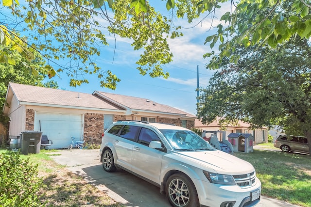 view of front of property featuring a garage