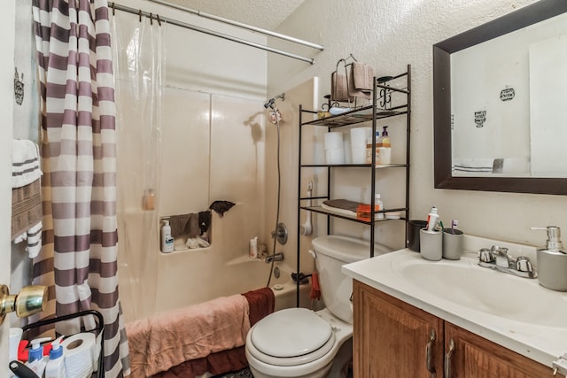 full bathroom featuring vanity, a textured ceiling, toilet, and shower / bath combination with curtain