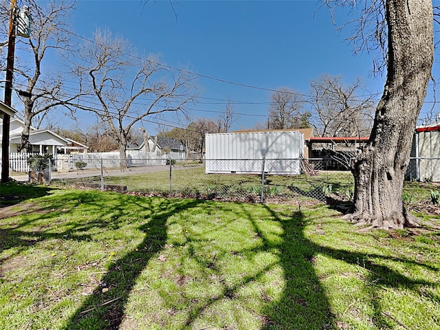 view of yard with fence