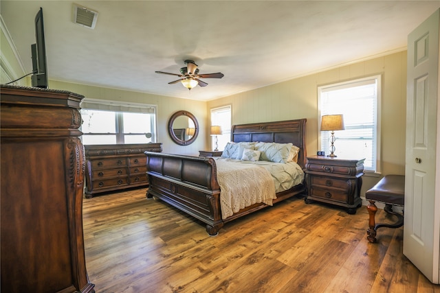 bedroom featuring dark wood-type flooring and ceiling fan