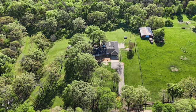 birds eye view of property with a rural view