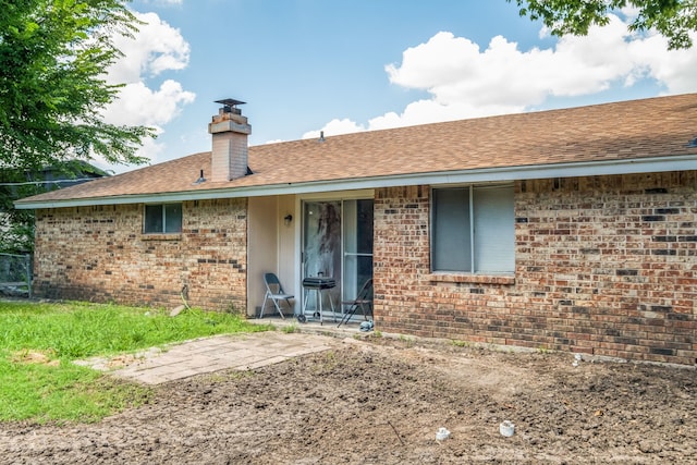 rear view of property with a patio