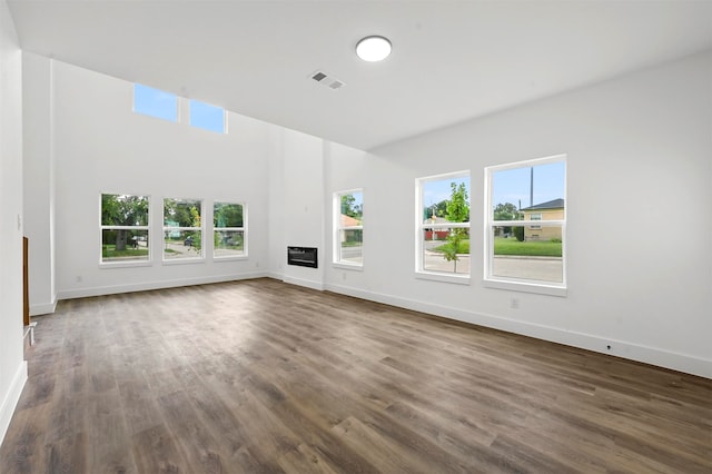 unfurnished living room with hardwood / wood-style floors