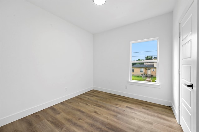 unfurnished bedroom with wood-type flooring