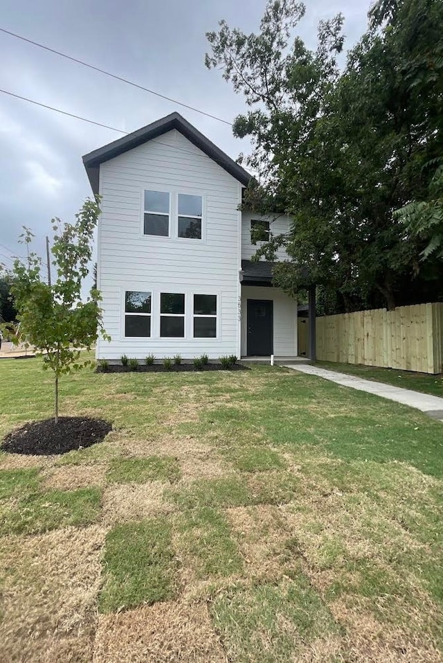 exterior space with a front lawn