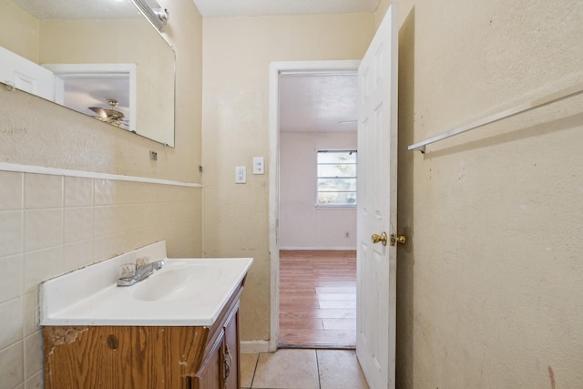 bathroom featuring hardwood / wood-style floors and vanity