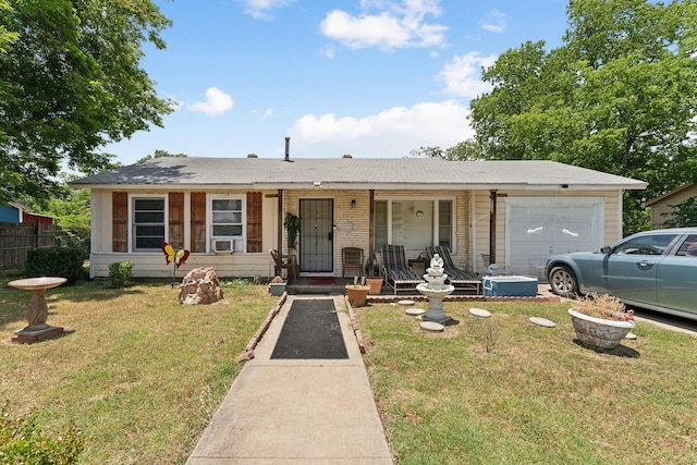 single story home with a porch, a garage, a front lawn, and cooling unit