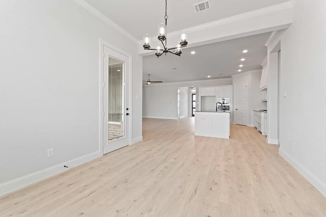 unfurnished living room featuring ceiling fan with notable chandelier, crown molding, light wood-type flooring, and sink