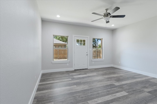 interior space with hardwood / wood-style flooring and ceiling fan