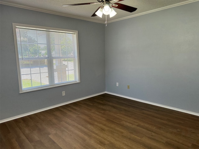 empty room featuring ornamental molding, a textured ceiling, ceiling fan, and dark wood-type flooring