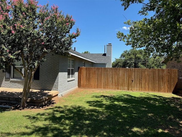 view of yard featuring fence