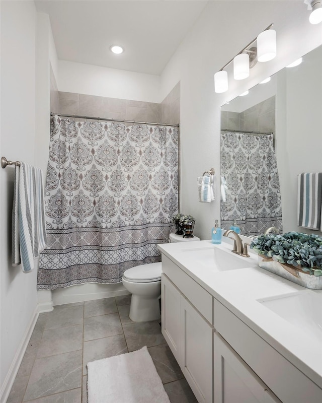 full bathroom with tile patterned flooring, vanity, toilet, and shower / bath combo