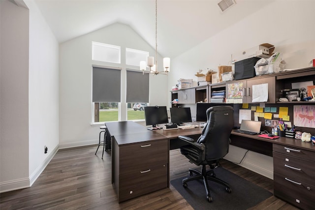 home office with dark hardwood / wood-style floors, an inviting chandelier, and vaulted ceiling