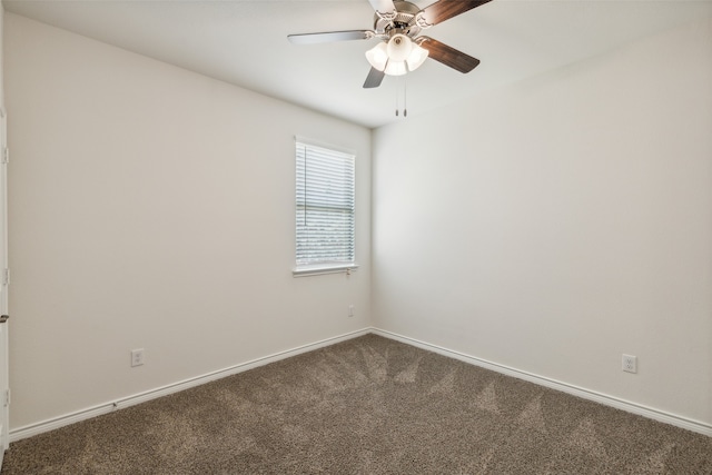 empty room featuring ceiling fan and carpet flooring