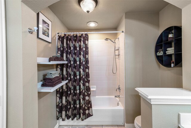 bathroom with shower / bathtub combination with curtain and toilet