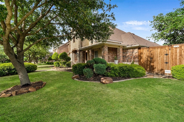 exterior space featuring a front yard