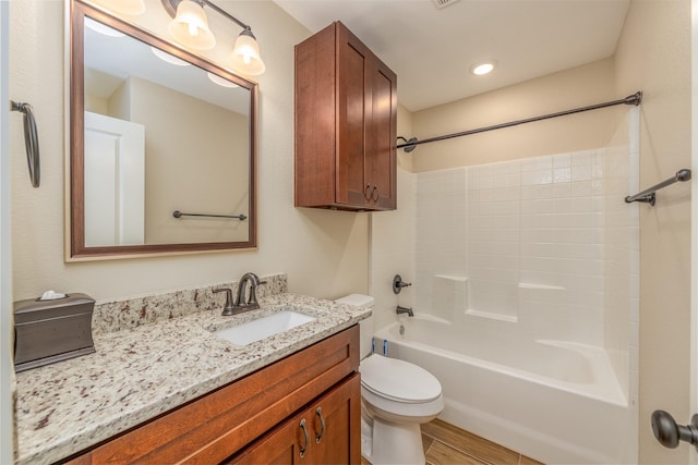 full bathroom with vanity, shower / bathing tub combination, and toilet