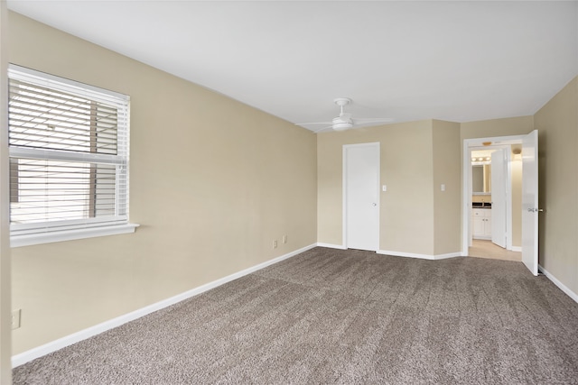 unfurnished bedroom with carpet and ceiling fan