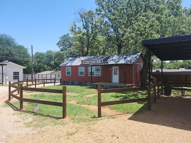 exterior space with an outbuilding