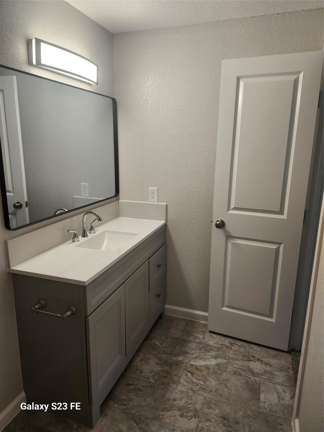 5280 Atwell Ln, Denton, TX 76208 - bathroom with vanity and baseboards