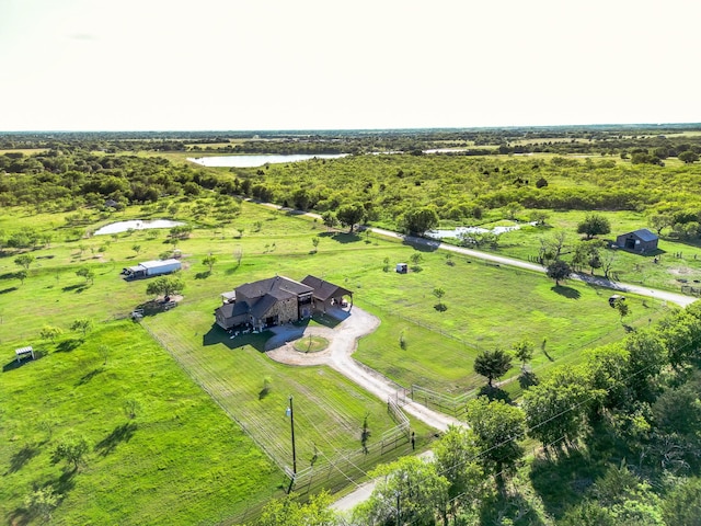 drone / aerial view with a rural view and a water view