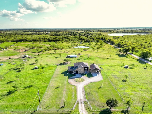 aerial view with a water view and a rural view