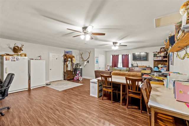 office area with ceiling fan and wood-type flooring