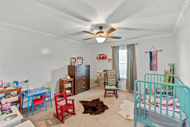 carpeted bedroom featuring crown molding and ceiling fan