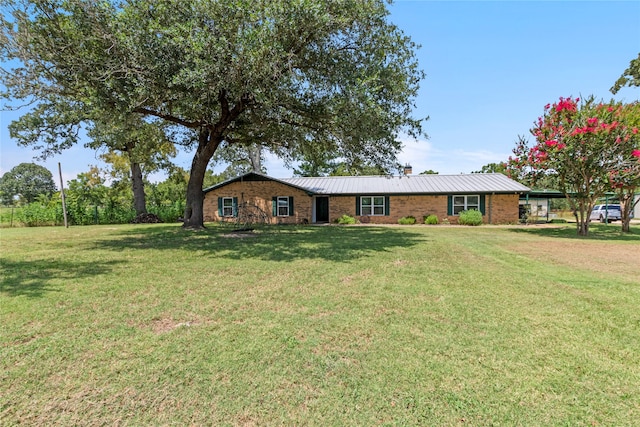 ranch-style house with a front yard