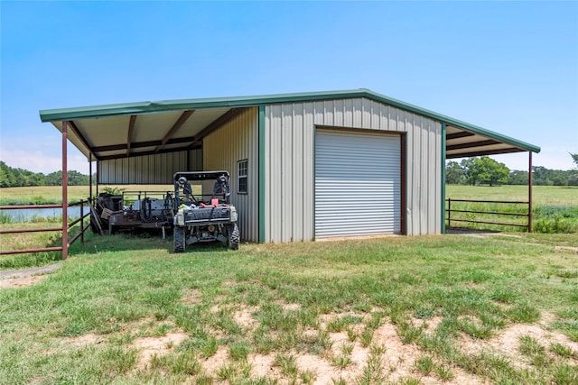 garage with a lawn