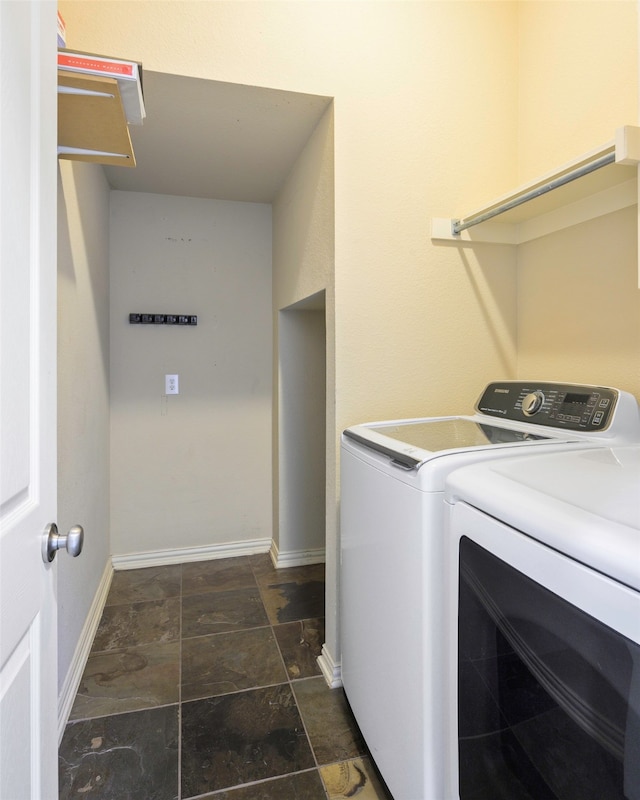 laundry room featuring separate washer and dryer