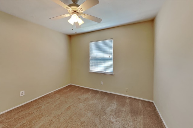 unfurnished room featuring ceiling fan and light carpet