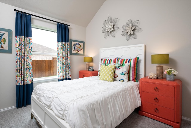 bedroom featuring carpet flooring and vaulted ceiling