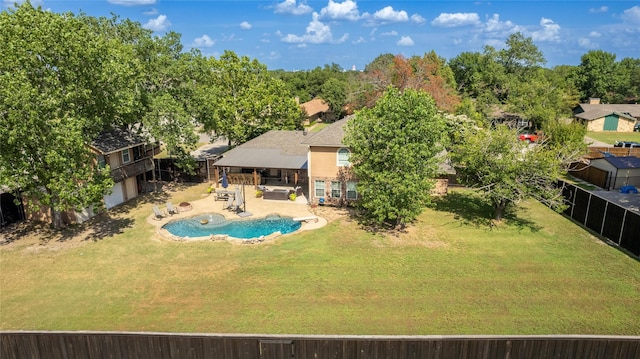 exterior space featuring a fenced backyard, a patio area, and a yard