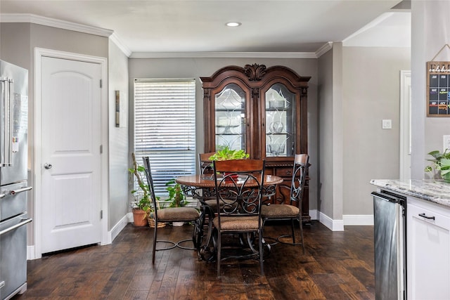dining room with baseboards, recessed lighting, crown molding, and dark wood-type flooring