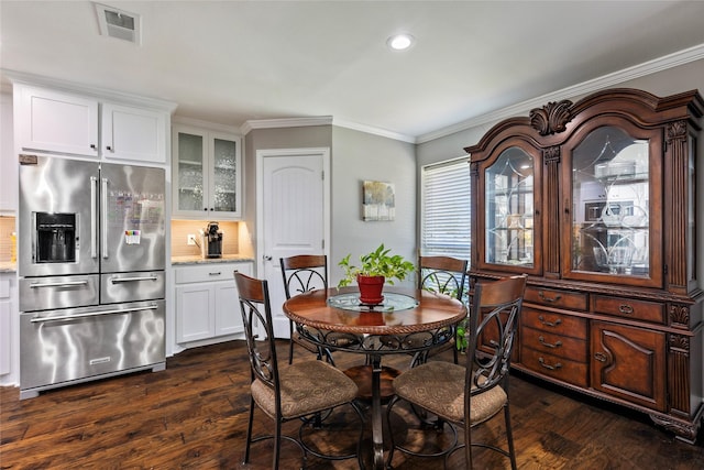 dining space featuring recessed lighting, visible vents, crown molding, and dark wood-type flooring